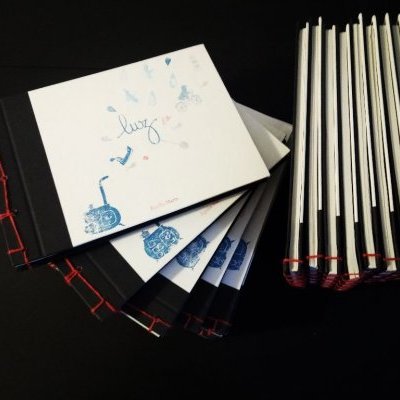 conte Luz, illustré au tampon encreur, reliure japonaise.