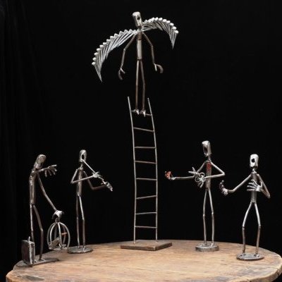 sculptures métal personnages Mouche